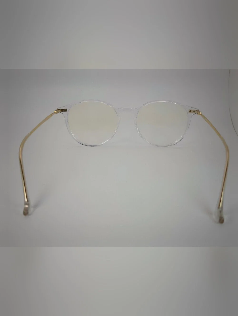 Amity. Clear Round Frame Glasses with Subtle Gold Temples. Opthalmic